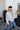 teen aged grils sitting wearing royal ranch hat and royal family farming crewneck in cream